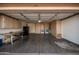 Garage with workbench and extra storage at 1511 W El Monte Pl, Chandler, AZ 85224