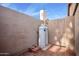 Two gas tanks are located near a wooden gate at 1511 W El Monte Pl, Chandler, AZ 85224