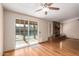 Living room with pool view, hardwood floors, and fireplace at 1511 W El Monte Pl, Chandler, AZ 85224