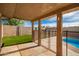 Covered patio overlooking pool and backyard at 1511 W El Monte Pl, Chandler, AZ 85224