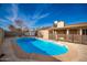 Inviting kidney-shaped pool with a safety fence at 1511 W El Monte Pl, Chandler, AZ 85224