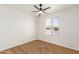 Cozy bedroom with ceiling fan and neutral carpet at 1527 W Rosemonte Dr, Phoenix, AZ 85027