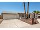 Single story home with a two car garage and a brick mailbox at 1527 W Rosemonte Dr, Phoenix, AZ 85027