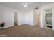 Spacious bedroom with bathroom access and closet at 15350 W Mauna Loa Ln, Surprise, AZ 85379