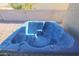 Clean and well-maintained hot tub in the backyard at 15350 W Mauna Loa Ln, Surprise, AZ 85379