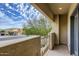 Private balcony with view of neighborhood and surrounding landscape at 15526 W Minnezona Ave, Goodyear, AZ 85395