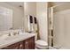 Clean bathroom with shower, toilet and vanity at 15526 W Minnezona Ave, Goodyear, AZ 85395