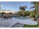 Enjoy Arizona evenings in this backyard pool and patio area at 15526 W Minnezona Ave, Goodyear, AZ 85395