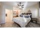 Bright bedroom with large bed and en-suite bathroom at 17200 W Bell Rd # 1165, Surprise, AZ 85374