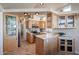 Modern kitchen featuring stainless steel appliances and light wood cabinets at 17200 W Bell Rd # 1165, Surprise, AZ 85374