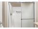 Walk-in shower with glass enclosure and grab bar at 17200 W Bell Rd # 899, Surprise, AZ 85374