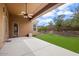 Covered patio with artificial turf and ceiling fan at 1731 W Steinway Dr, Phoenix, AZ 85041