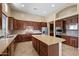 Spacious kitchen with granite counters and stainless steel appliances at 1731 W Steinway Dr, Phoenix, AZ 85041