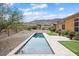 Private lap pool with mountain views and artificial turf at 1731 W Steinway Dr, Phoenix, AZ 85041