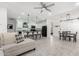 Open concept kitchen and dining area with modern finishes at 17662 W Daley Ln, Surprise, AZ 85387