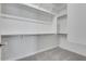 Spacious closet with double hanging rods and shelving at 18104 W Silverwood Dr, Goodyear, AZ 85338