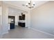 Modern kitchen with dark cabinetry and granite countertops at 18104 W Silverwood Dr, Goodyear, AZ 85338