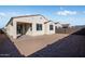 House exterior showcasing backyard and patio at 18111 W Hiddenview Dr, Goodyear, AZ 85338