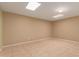 Empty basement room with tiled floor and recessed lighting at 1833 W Citrus Way, Phoenix, AZ 85015