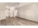 Bright bedroom includes wood-look flooring and adjacent bathroom at 1833 W Citrus Way, Phoenix, AZ 85015