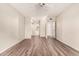 Spacious bedroom with wood-look floors, bathroom and closet at 1833 W Citrus Way, Phoenix, AZ 85015