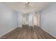 Bedroom with wood-look floors and mirrored closet doors at 1833 W Citrus Way, Phoenix, AZ 85015