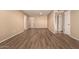 Living room with wood-look floors and neutral walls at 1833 W Citrus Way, Phoenix, AZ 85015