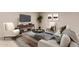 Comfortable living room featuring a neutral color palette, modern furniture, and stylish decor at 1833 W Citrus Way, Phoenix, AZ 85015