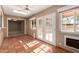 Sunroom with tile floors and French doors leading to the patio at 1833 W Citrus Way, Phoenix, AZ 85015