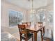 Bright dining area with bay window and wood table and chairs at 18466 N 5Th Ave, Phoenix, AZ 85023