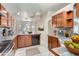 Well-equipped kitchen with ample cabinet space and an island at 18466 N 5Th Ave, Phoenix, AZ 85023