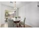 Charming dining area with floral chairs and a white table at 1913 E Sandra Ter, Phoenix, AZ 85022