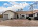 Single-story home with attached garage and landscaped front yard at 1913 E Sandra Ter, Phoenix, AZ 85022