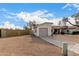 Side view of house showcasing garage and landscaping at 1913 E Sandra Ter, Phoenix, AZ 85022