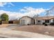 Front view of house, showing garage and driveway at 1913 E Sandra Ter, Phoenix, AZ 85022