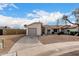 House exterior showcases a two-car garage and front yard at 1913 E Sandra Ter, Phoenix, AZ 85022