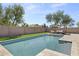 Spacious backyard with a refreshing pool and lush grass at 205 W Blue Ridge Way, Chandler, AZ 85248