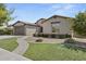 One-story home with a two-car garage and landscaped front yard at 205 W Blue Ridge Way, Chandler, AZ 85248