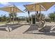 Community playground with shade structures and play equipment at 205 W Blue Ridge Way, Chandler, AZ 85248