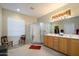 Bathroom features double sinks, a large shower, and light wood cabinets at 21705 N Black Bear Lodge Dr, Surprise, AZ 85387