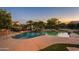 Tranquil pool area at sunset at 21705 N Black Bear Lodge Dr, Surprise, AZ 85387