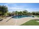 Refreshing kidney-shaped pool with rock waterfall feature at 21705 N Black Bear Lodge Dr, Surprise, AZ 85387