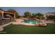 Relaxing pool and spa area at dusk at 21705 N Black Bear Lodge Dr, Surprise, AZ 85387