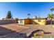 House back exterior view with spacious gravel yard at 2235 W Villa Rita Dr, Phoenix, AZ 85023