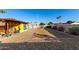 Large backyard with gravel landscaping and open space at 2235 W Villa Rita Dr, Phoenix, AZ 85023