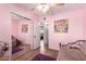 Bright bedroom with a ceiling fan, mirrored closet, and decorative wall art at 2235 W Villa Rita Dr, Phoenix, AZ 85023