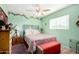 Bright bedroom with a double bed and colorful decor at 2235 W Villa Rita Dr, Phoenix, AZ 85023