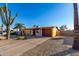 Ranch style home with gravel driveway and cacti in the front yard at 2235 W Villa Rita Dr, Phoenix, AZ 85023