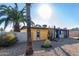 Front view of the house with a palm tree and gravel landscaping at 2235 W Villa Rita Dr, Phoenix, AZ 85023