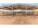 Metal-roofed barn with stalls, great for animals at 22605 W Baker Dr, Wittmann, AZ 85361